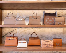 Load image into Gallery viewer, Bespoke oak shelving installation for Sellier Knightsbridge luxury boutique in London
