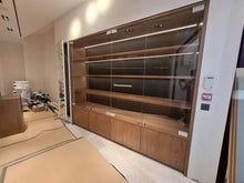 Load image into Gallery viewer, Bespoke oak shelving installation for Sellier Knightsbridge luxury boutique in London