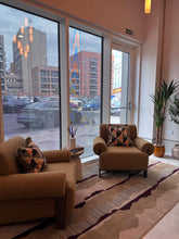 Load image into Gallery viewer, Luxury marketing suite in Hendon featuring bespoke seating and custom-made furniture