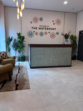 Load image into Gallery viewer, Luxury marketing suite in Hendon featuring bespoke seating and custom-made furniture
