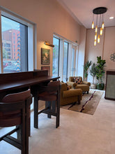 Load image into Gallery viewer, Luxury marketing suite in Hendon featuring bespoke seating and custom-made furniture
